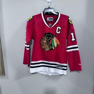 Women's Reebok Chicago Blackhawks Jonathan Toews #19 NHL Jersey. Size M